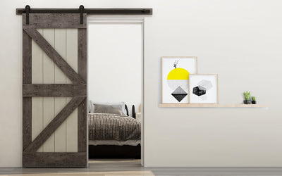 Barn door hardware kit with wheel and wheel track